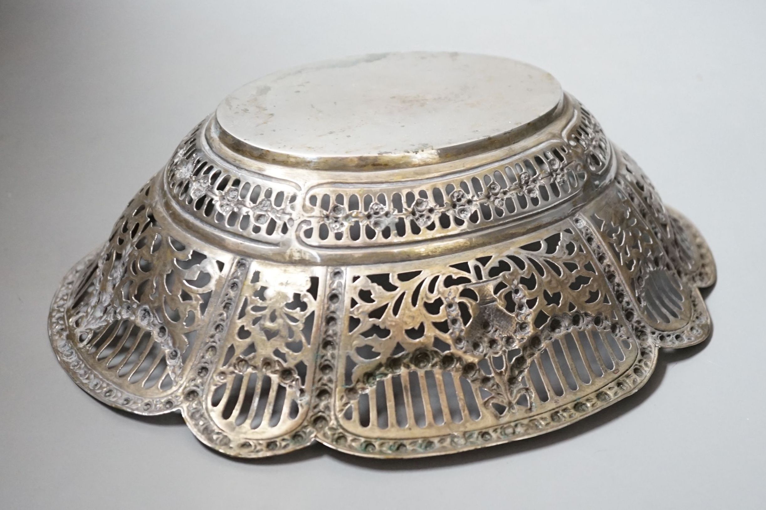 An early 20th century German 800 standard pierced white metal oval fruit bowl, 26.3cm, 10oz.